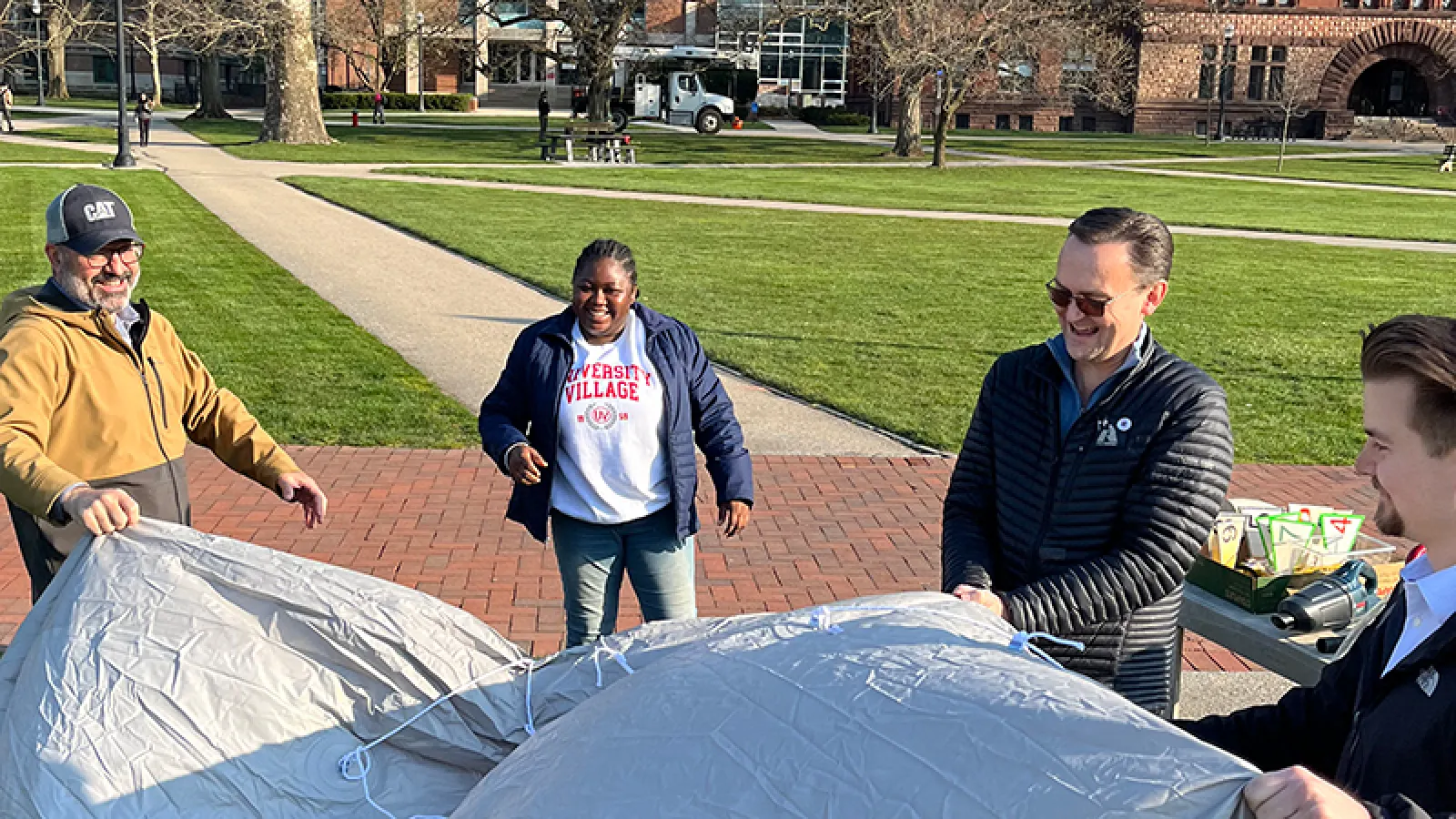 Oluwadamilola Salau, Adam Tjoelker, Jens Blegvad, and Alvaro Montenegro preparing the blimp in the Oval - 3/29/2024