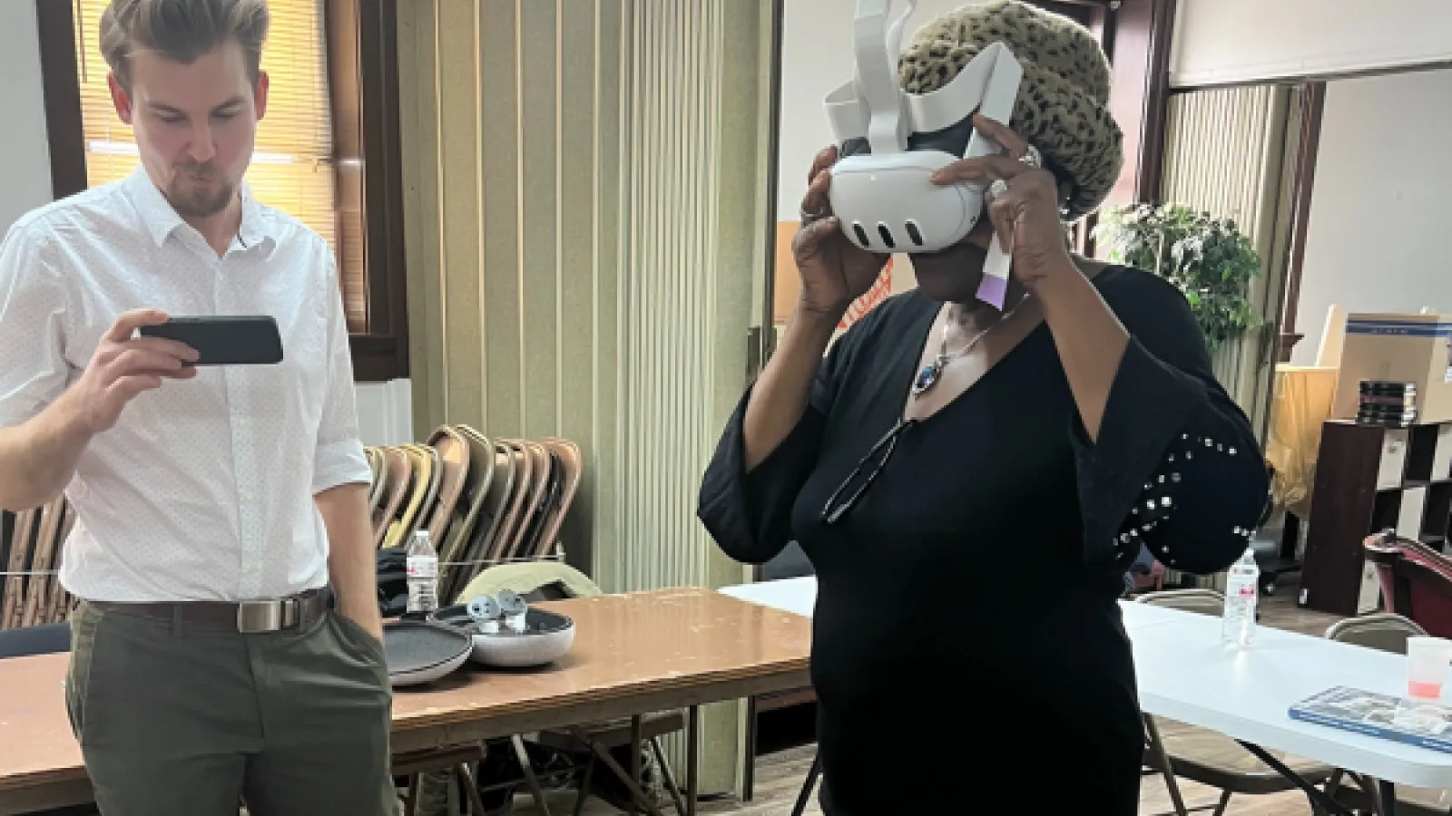 Adam Tjoelker demonstrates virtual reality headset